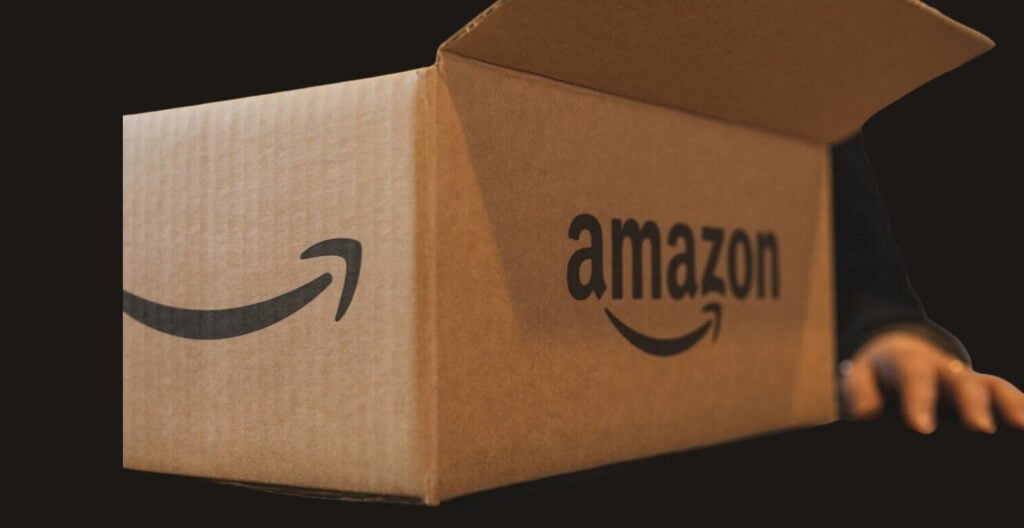  Amazon logo displayed on a package being delivered