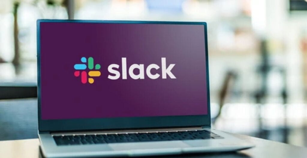 Brand logo of slack displayed on a laptop screen