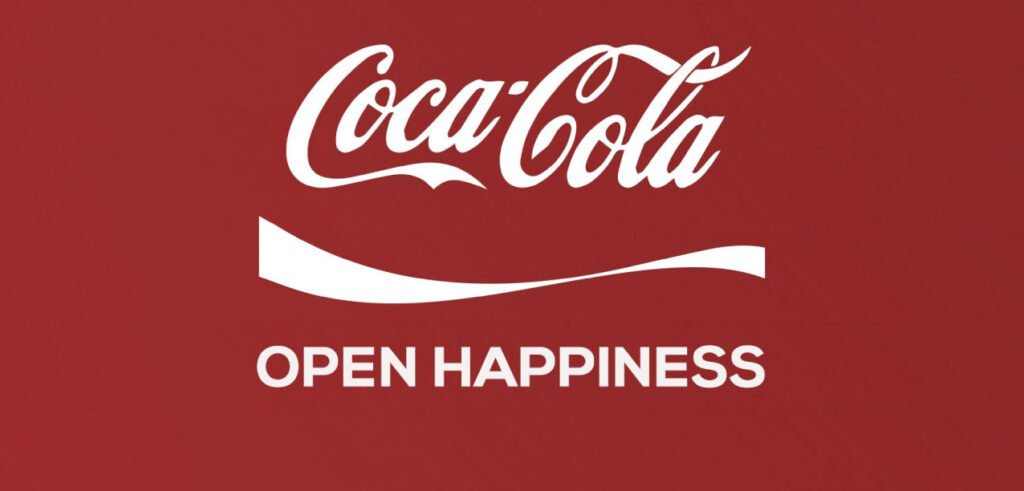 Coca-Cola’s iconic red and white logo with ‘Open Happiness’ slogan – Consistency and global recognition.
